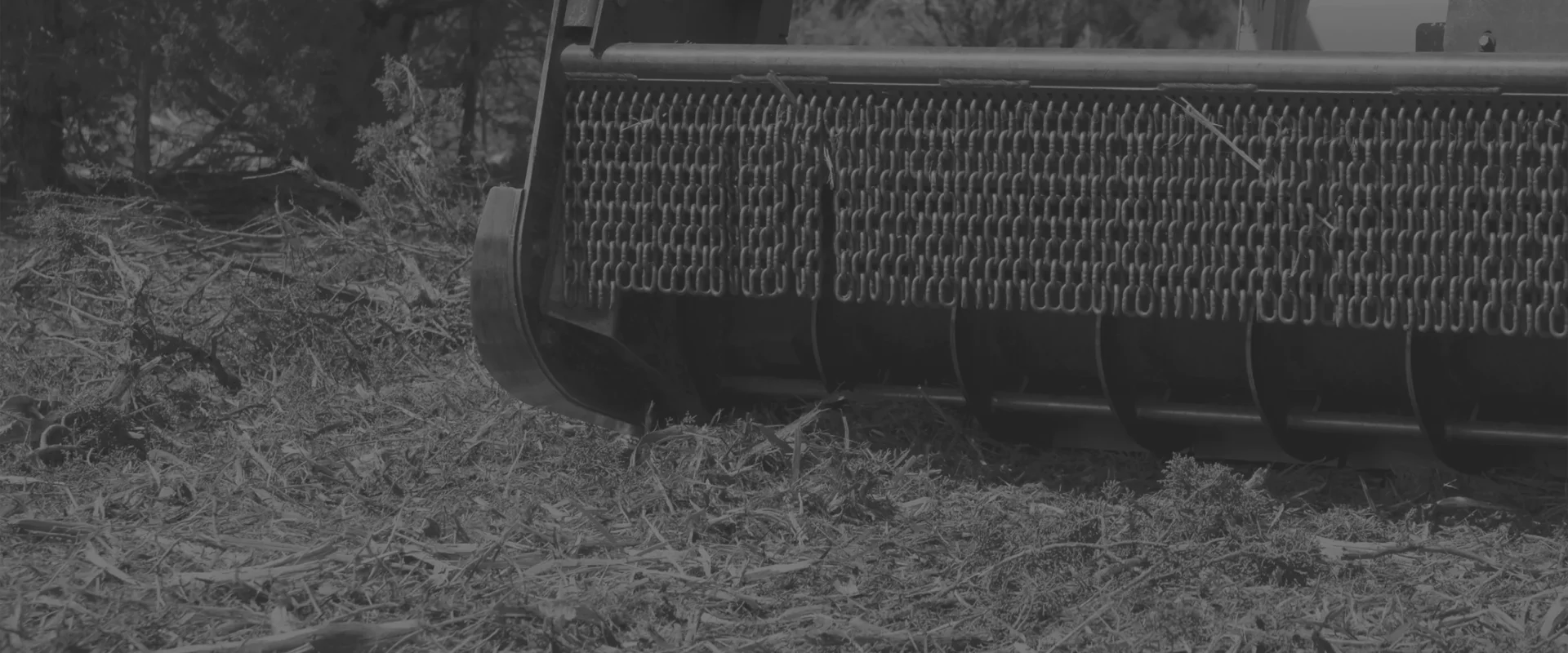 a skid mulching truck clearing the land